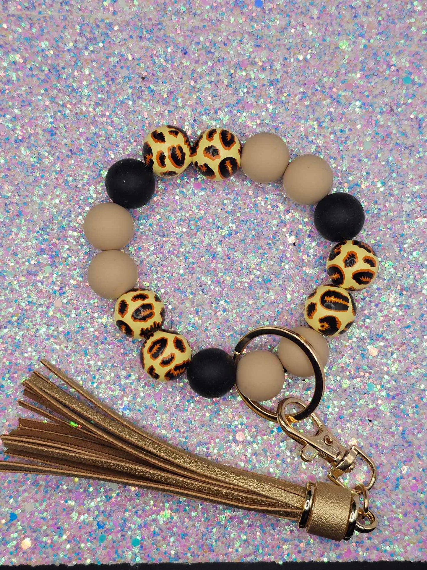 Tan leopard Wristlet with tan fringe