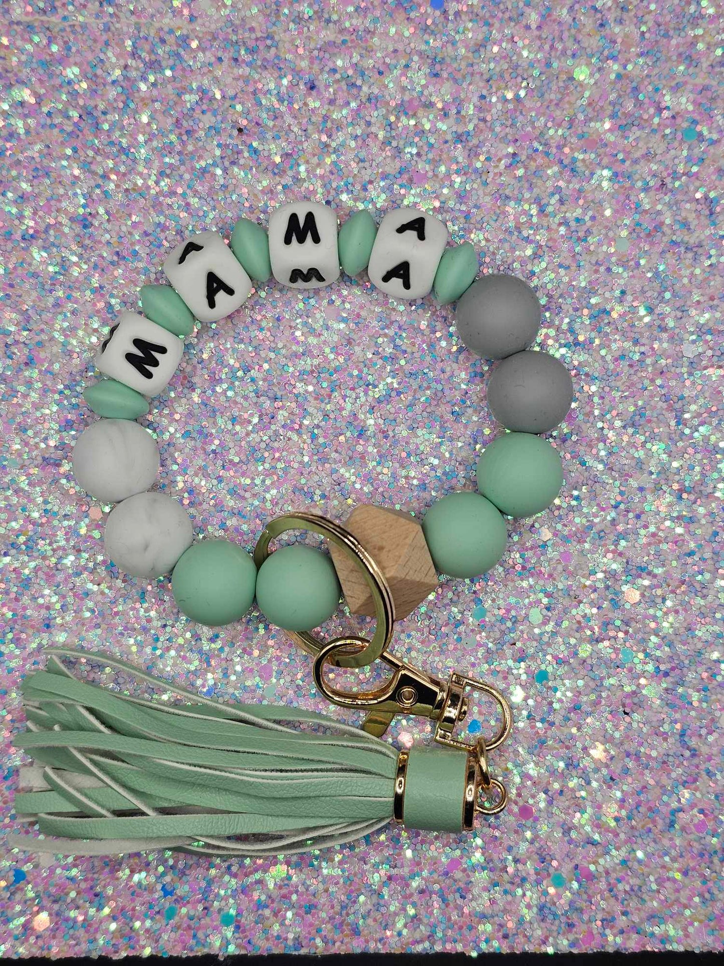 Grean and white mama Wristlet with green fringe