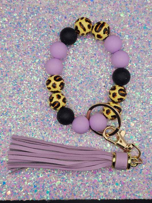 Purple Leopard wristlet with purple ffringe